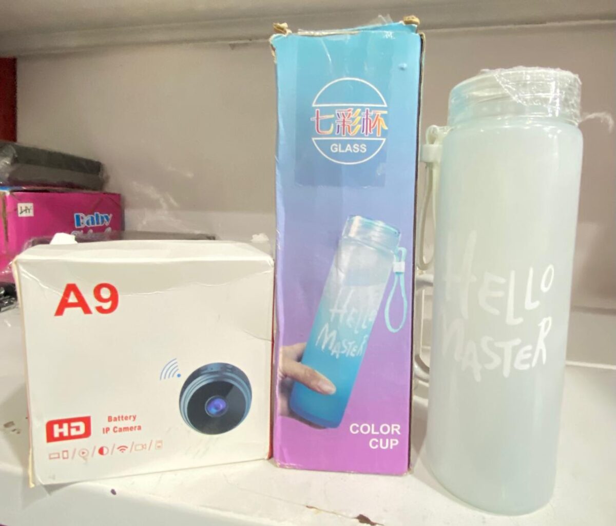 Deal pack of 2 - A9 Mini Camera & Frosted Glass Water Bottle (Random color) Long Live pakistan